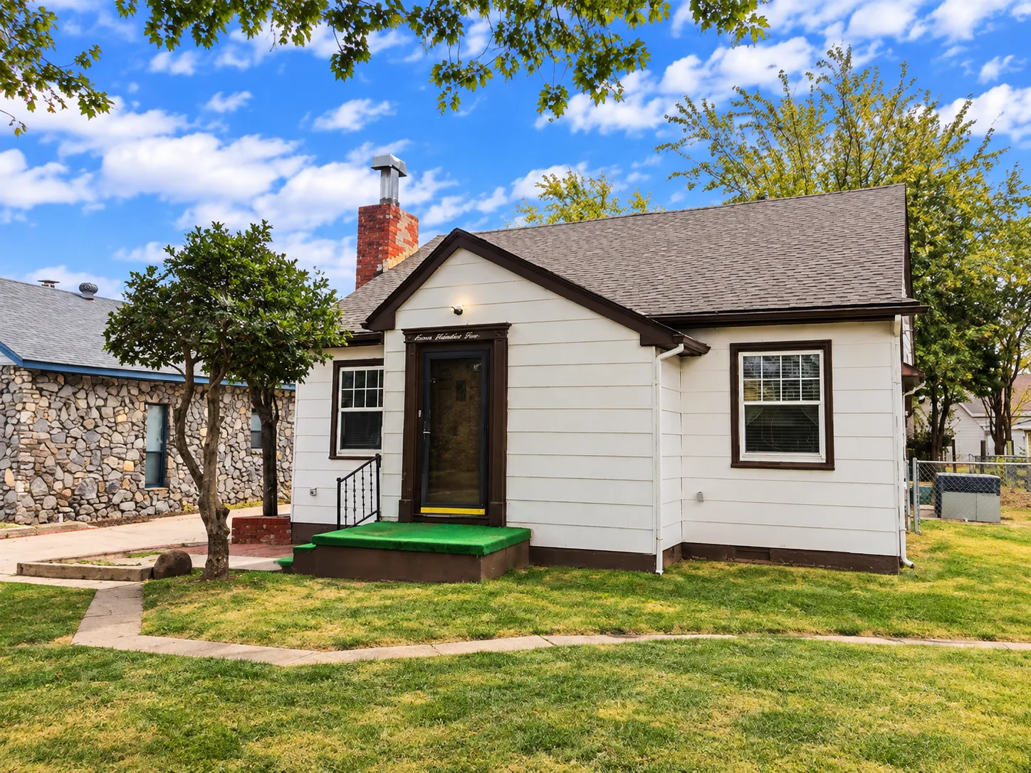 Front exterior of the house at 705 S. Miles Ave